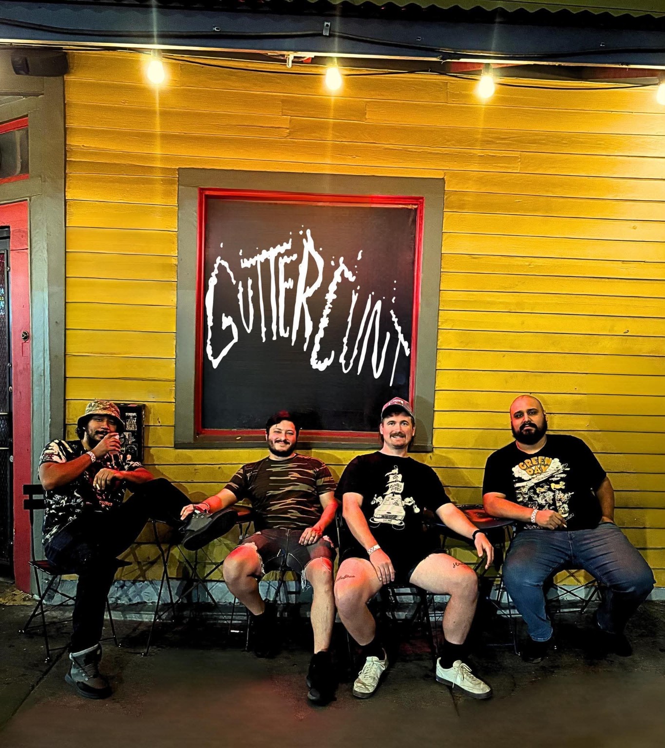 Guttercunt band members outside Holy Diver in New Orleans